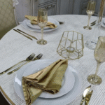 Stylish disposable tableware and table accessories organized for an outdoor occasion